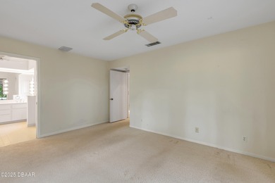 Take in peaceful golf course views from this inviting 2 bedroom on Sugar Mill Country Club in Florida - for sale on GolfHomes.com, golf home, golf lot