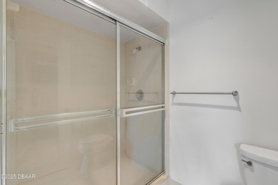 Take in peaceful golf course views from this inviting 2 bedroom on Sugar Mill Country Club in Florida - for sale on GolfHomes.com, golf home, golf lot