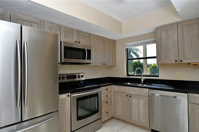 Enjoy ultimate privacy in this 2Br/2Bath first-floor corner unit on Cross Creek Country Club in Florida - for sale on GolfHomes.com, golf home, golf lot