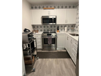 Completely renovated, no detail overlooked. New kitchen and on Pembroke Lakes Golf Club in Florida - for sale on GolfHomes.com, golf home, golf lot