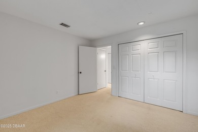 Take in peaceful golf course views from this inviting 2 bedroom on Sugar Mill Country Club in Florida - for sale on GolfHomes.com, golf home, golf lot