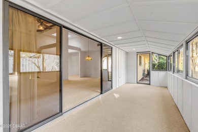 Take in peaceful golf course views from this inviting 2 bedroom on Sugar Mill Country Club in Florida - for sale on GolfHomes.com, golf home, golf lot