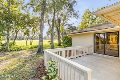 Take in peaceful golf course views from this inviting 2 bedroom on Sugar Mill Country Club in Florida - for sale on GolfHomes.com, golf home, golf lot
