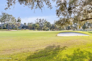 Take in peaceful golf course views from this inviting 2 bedroom on Sugar Mill Country Club in Florida - for sale on GolfHomes.com, golf home, golf lot