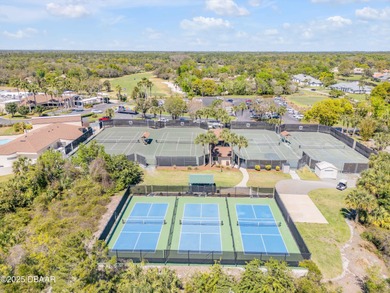 Take in peaceful golf course views from this inviting 2 bedroom on Sugar Mill Country Club in Florida - for sale on GolfHomes.com, golf home, golf lot