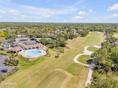Take in peaceful golf course views from this inviting 2 bedroom on Sugar Mill Country Club in Florida - for sale on GolfHomes.com, golf home, golf lot