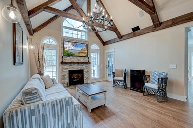 Situated on over an acre along the fourth hole of the Dunes West on Dunes West Golf Club in South Carolina - for sale on GolfHomes.com, golf home, golf lot