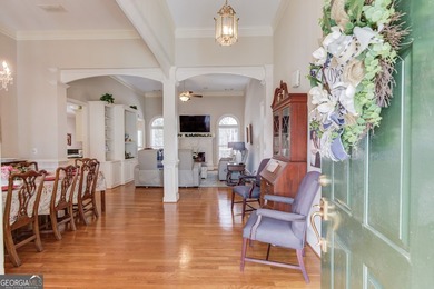 Tucked away on 1.5 acres in a quiet cul-de-sac of the on The Providence Club in Georgia - for sale on GolfHomes.com, golf home, golf lot