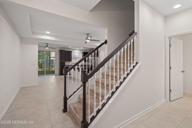 This charming Segovia townhome offers an inviting open floor on Slammer and Squire Golf Course in Florida - for sale on GolfHomes.com, golf home, golf lot