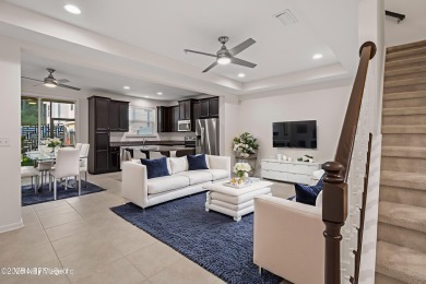 This charming Segovia townhome offers an inviting open floor on Slammer and Squire Golf Course in Florida - for sale on GolfHomes.com, golf home, golf lot