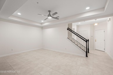 This charming Segovia townhome offers an inviting open floor on Slammer and Squire Golf Course in Florida - for sale on GolfHomes.com, golf home, golf lot