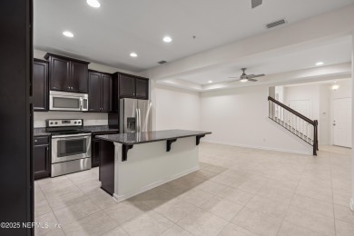 This charming Segovia townhome offers an inviting open floor on Slammer and Squire Golf Course in Florida - for sale on GolfHomes.com, golf home, golf lot