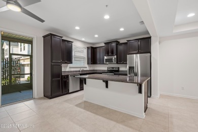 This charming Segovia townhome offers an inviting open floor on Slammer and Squire Golf Course in Florida - for sale on GolfHomes.com, golf home, golf lot