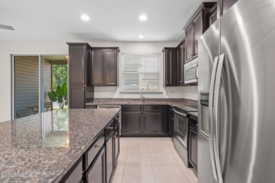 This charming Segovia townhome offers an inviting open floor on Slammer and Squire Golf Course in Florida - for sale on GolfHomes.com, golf home, golf lot