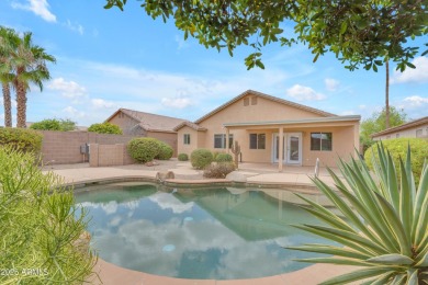 This beautifully maintained home features a sparkling salt water on The Golf Club At Johnson Ranch in Arizona - for sale on GolfHomes.com, golf home, golf lot