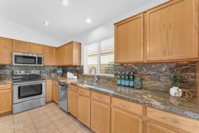This beautifully maintained home features a sparkling salt water on The Golf Club At Johnson Ranch in Arizona - for sale on GolfHomes.com, golf home, golf lot