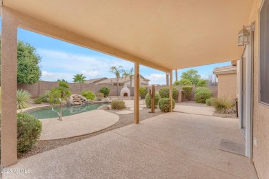 This beautifully maintained home features a sparkling salt water on The Golf Club At Johnson Ranch in Arizona - for sale on GolfHomes.com, golf home, golf lot