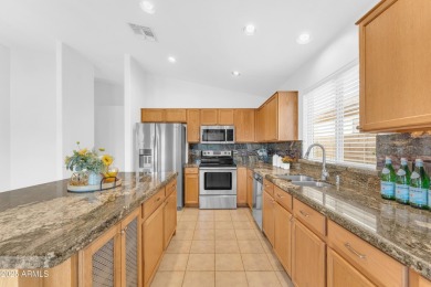 This beautifully maintained home features a sparkling salt water on The Golf Club At Johnson Ranch in Arizona - for sale on GolfHomes.com, golf home, golf lot