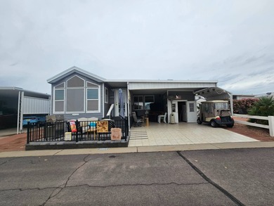 This super spacious 1BD 2BA home features a large Arizona room on Viewpoint Golf Resort in Arizona - for sale on GolfHomes.com, golf home, golf lot
