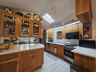This super spacious 1BD 2BA home features a large Arizona room on Viewpoint Golf Resort in Arizona - for sale on GolfHomes.com, golf home, golf lot