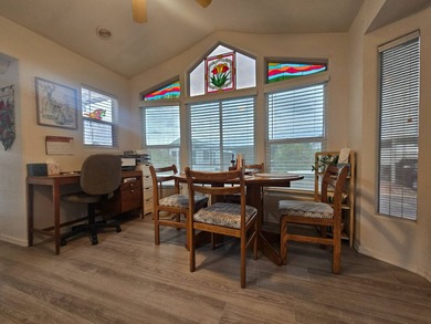 This super spacious 1BD 2BA home features a large Arizona room on Viewpoint Golf Resort in Arizona - for sale on GolfHomes.com, golf home, golf lot
