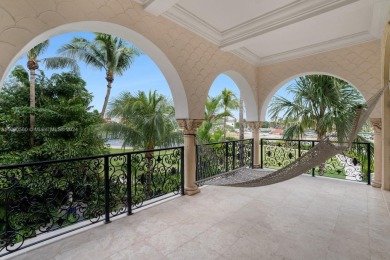 Welcome to your exclusive sanctuary on Fisher Island! Surrounded on Fisher Island Club in Florida - for sale on GolfHomes.com, golf home, golf lot