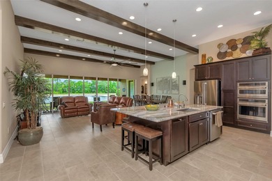 WATER VIEW LOT offering an expansive 425-ft serene view across on Seven Springs Golf and Country Club in Florida - for sale on GolfHomes.com, golf home, golf lot