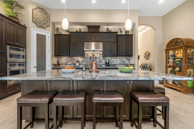 WATER VIEW LOT offering an expansive 425-ft serene view across on Seven Springs Golf and Country Club in Florida - for sale on GolfHomes.com, golf home, golf lot