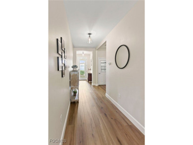 Welcome to this beautifully maintained 2019 single-family home on River Hall Country Club in Florida - for sale on GolfHomes.com, golf home, golf lot