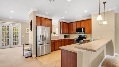 Welcome to this spacious and modern townhome located in the on Timacuan Golf and Country Club in Florida - for sale on GolfHomes.com, golf home, golf lot