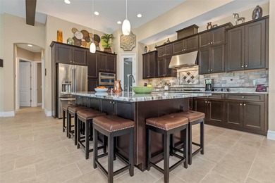 WATER VIEW LOT offering an expansive 425-ft serene view across on Seven Springs Golf and Country Club in Florida - for sale on GolfHomes.com, golf home, golf lot