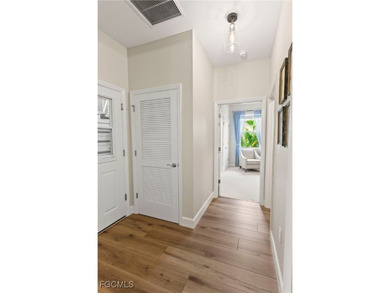 Welcome to this beautifully maintained 2019 single-family home on River Hall Country Club in Florida - for sale on GolfHomes.com, golf home, golf lot