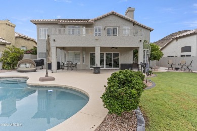 Experience luxury living with this stunning 5-bedroom on The Foothills Golf Club in Arizona - for sale on GolfHomes.com, golf home, golf lot