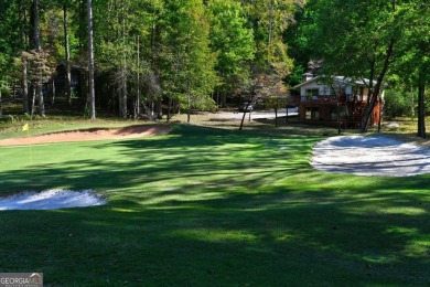 Located on the 17th green of the golf course in the resort-like on Bent Tree Golf Course in Georgia - for sale on GolfHomes.com, golf home, golf lot