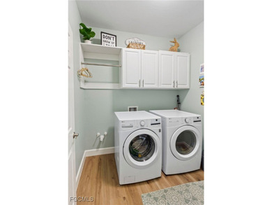 Welcome to this beautifully maintained 2019 single-family home on River Hall Country Club in Florida - for sale on GolfHomes.com, golf home, golf lot