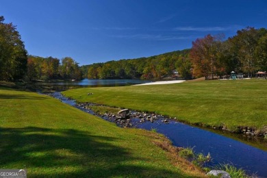 Located on the 17th green of the golf course in the resort-like on Bent Tree Golf Course in Georgia - for sale on GolfHomes.com, golf home, golf lot