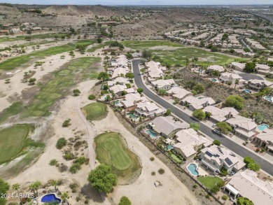 Experience luxury living with this stunning 5-bedroom on The Foothills Golf Club in Arizona - for sale on GolfHomes.com, golf home, golf lot