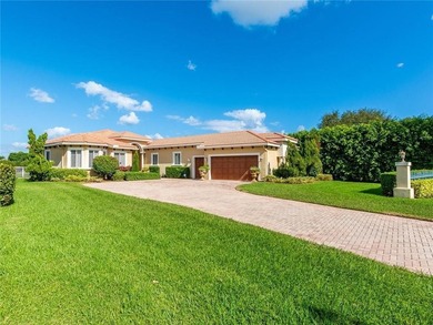 Magnificent 4-bedroom, 4 full bath pool home with exceptional on  in Florida - for sale on GolfHomes.com, golf home, golf lot