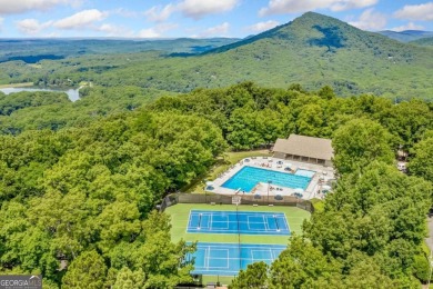 Located on the 17th green of the golf course in the resort-like on Bent Tree Golf Course in Georgia - for sale on GolfHomes.com, golf home, golf lot