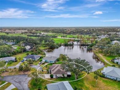 This stunning 3-bedroom, 2-bathroom lakefront home in the highly on Boca Royale Golf and Country Club in Florida - for sale on GolfHomes.com, golf home, golf lot