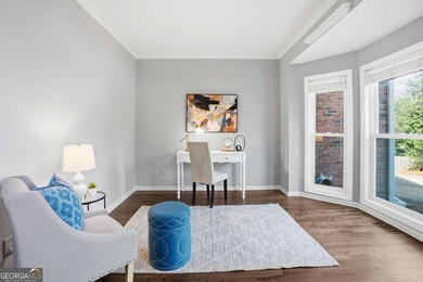 Welcome to this exceptional brick estate in the highly desirable on Towne Lake Hills Golf Club in Georgia - for sale on GolfHomes.com, golf home, golf lot