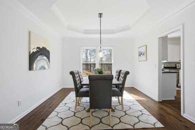 Welcome to this exceptional brick estate in the highly desirable on Towne Lake Hills Golf Club in Georgia - for sale on GolfHomes.com, golf home, golf lot