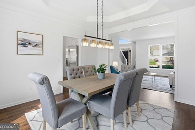 Welcome to this exceptional brick estate in the highly desirable on Towne Lake Hills Golf Club in Georgia - for sale on GolfHomes.com, golf home, golf lot