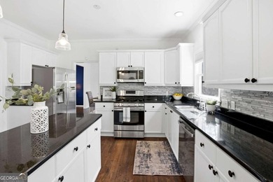 Welcome to this exceptional brick estate in the highly desirable on Towne Lake Hills Golf Club in Georgia - for sale on GolfHomes.com, golf home, golf lot