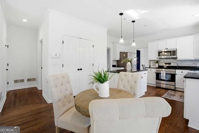 Welcome to this exceptional brick estate in the highly desirable on Towne Lake Hills Golf Club in Georgia - for sale on GolfHomes.com, golf home, golf lot