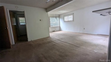 MOTIVATED SELLER! Three-bedroom, 2 full baths ranch. Located on The Links At Crystal Lake in Michigan - for sale on GolfHomes.com, golf home, golf lot