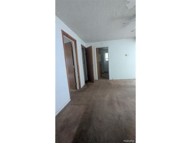 MOTIVATED SELLER! Three-bedroom, 2 full baths ranch. Located on The Links At Crystal Lake in Michigan - for sale on GolfHomes.com, golf home, golf lot