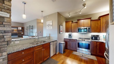 Looking for a top floor condo with priceless views of woods on Blue Top Ridge At Riverside in Iowa - for sale on GolfHomes.com, golf home, golf lot