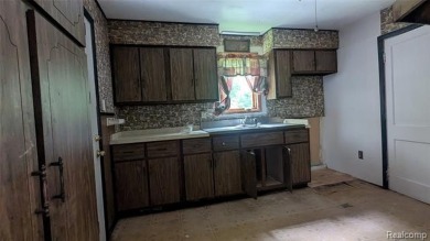 MOTIVATED SELLER! Three-bedroom, 2 full baths ranch. Located on The Links At Crystal Lake in Michigan - for sale on GolfHomes.com, golf home, golf lot