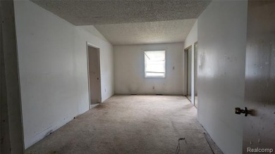 MOTIVATED SELLER! Three-bedroom, 2 full baths ranch. Located on The Links At Crystal Lake in Michigan - for sale on GolfHomes.com, golf home, golf lot